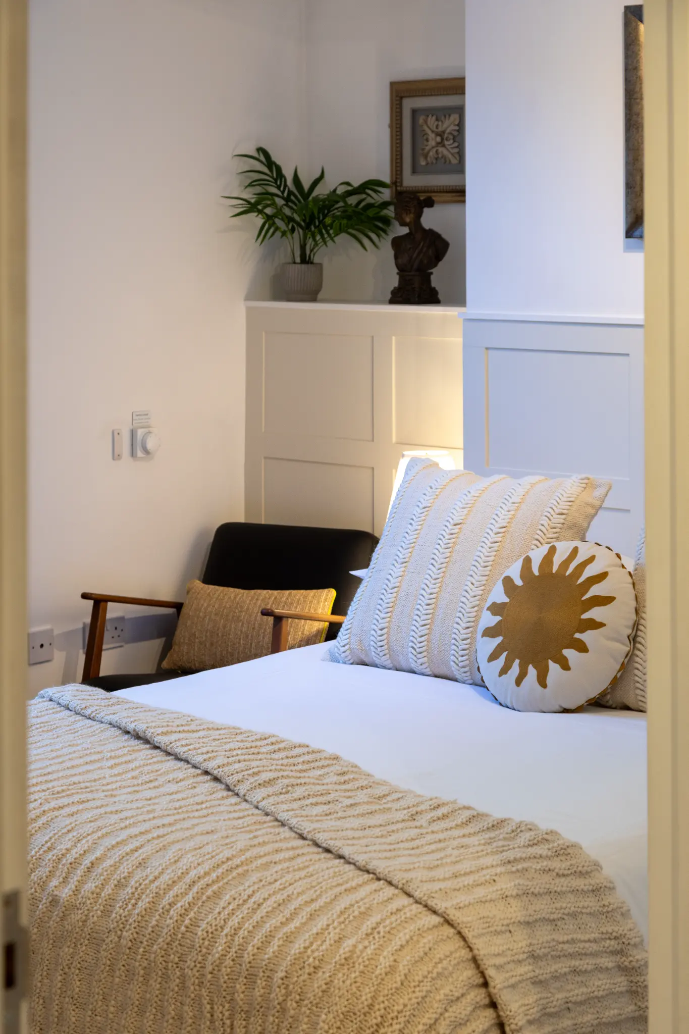Bedroom viewed through doorway at Ferndale Mews Bristol