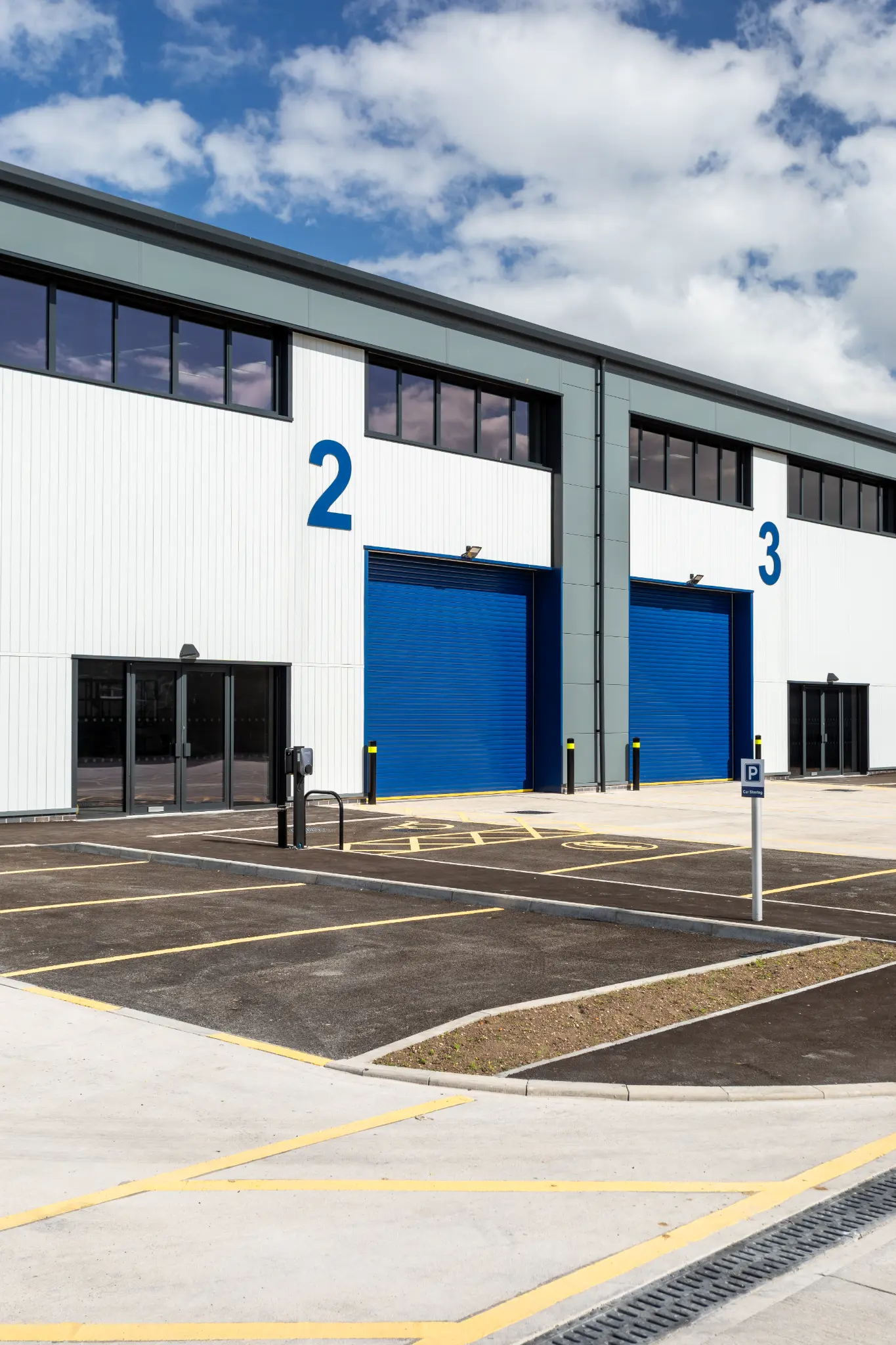 Units two and three at Rotor Trade Park with blue roller shutter doors