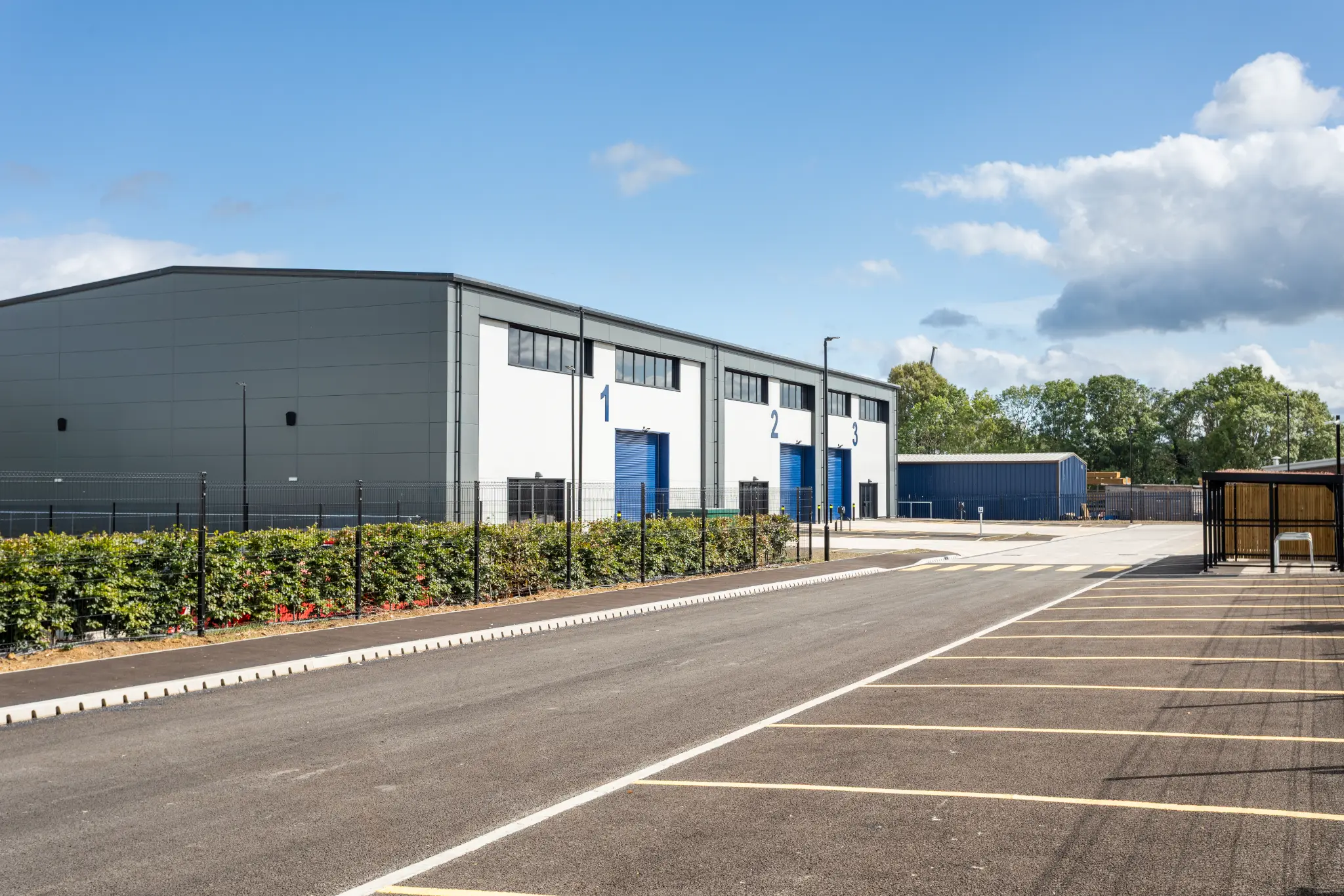 Marked car parking beside the Rotor Trade Park industrial terrace